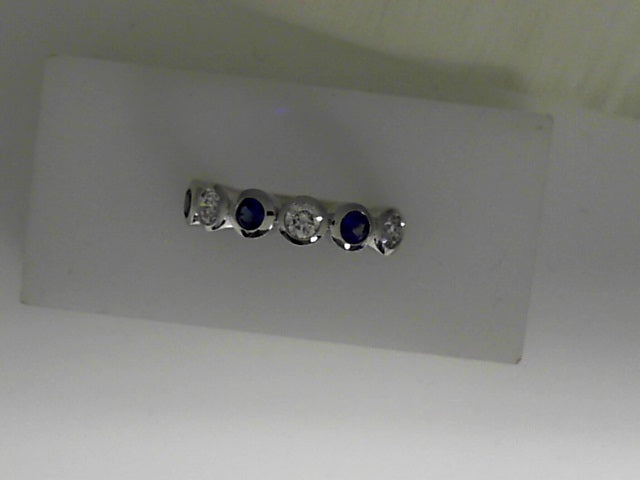 Contemporary Ring With Round Sapphires and Diamonds