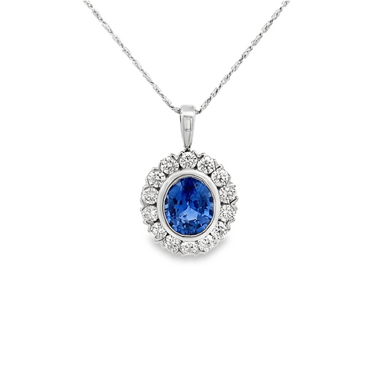 Vardy's Collection Oval Blue Sapphire and Round Diamond Halo Pendant Necklace in 18K White Gold (3.91ct)