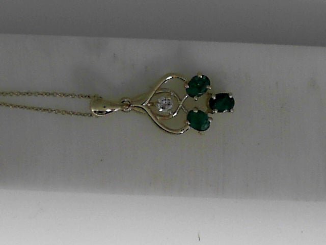 Vardy's Collection Oval Emerald Drop Pendant with Round Diamond in 14K Yellow Gold (0.59ct)