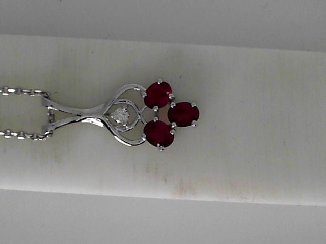 Vardy's Collection Oval Ruby and Round Diamond Free Form Pendant Necklace in 14K White Gold (1.38ct)