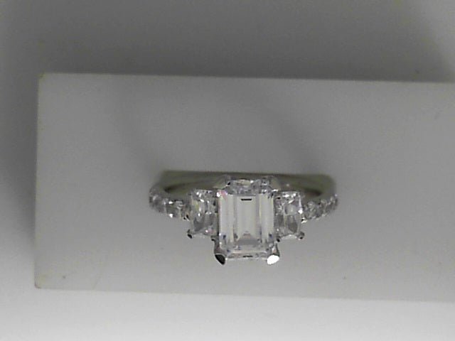 Vardy's Collection Round and Emerald Cut Diamond 3 Stone Engagement Ring in White Sterling Silver (1.06ct)