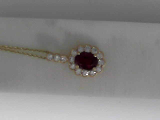 Vardy's Collection Round Diamond and Oval Ruby Halo Pendant Necklace in 14K Yellow Gold (2.04ct)