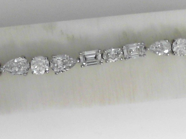 Vardy's Collection Various Shapes F VVS2 Diamond Tennis Bracelet in Platinum (12.60ctw)