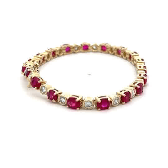 Vardy's Collection Oval Ruby and Round Diamond Tennis Bracelet in 14K Yellow Gold (10.56ctw)