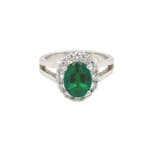 14 Karat White Gold Halo Setting Oval Emerald Ring
