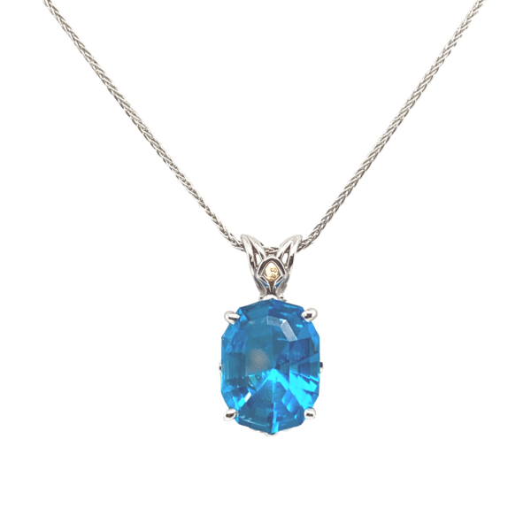 14 Karat White Gold Fantasy Cut Blue Topaz Pendant
