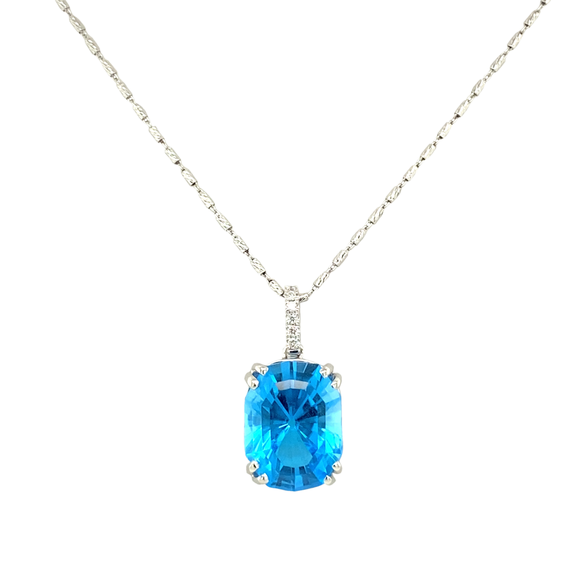 14 Karat White Gold Diamond and Blue Topaz Pendant