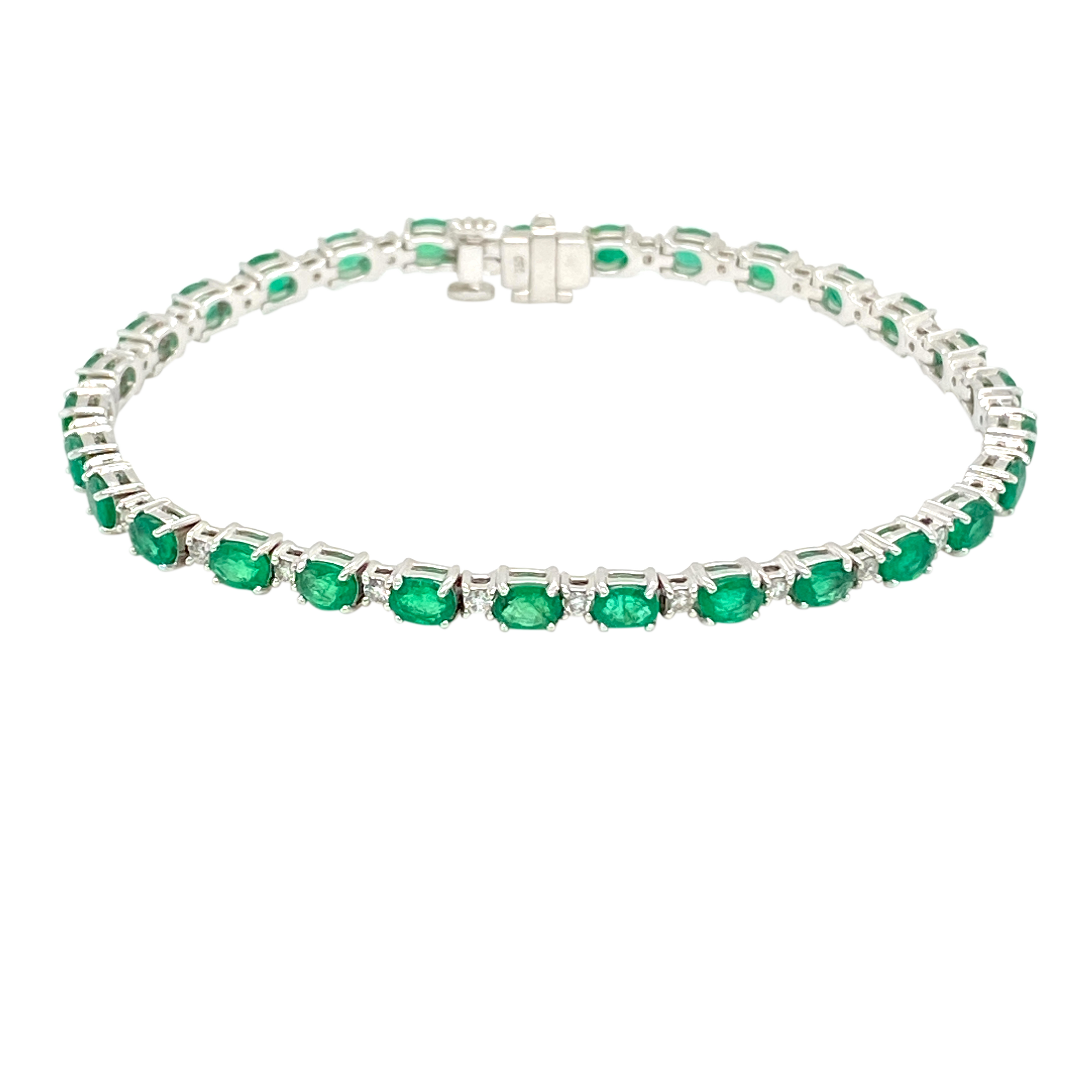 18 Karat White Gold Diamond and Emerald Bracelet